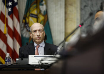 WASHINGTON, DC - OCTOBER 03: Securities and Exchange Commission (SEC) Chair Gary Gensler listens during a meeting with the Treasury Department's Financial Stability Oversight Council at the U.S. Treasury Department on October 03, 2022 in Washington, DC. The council held the meeting to discuss a range of topics including climate-related financial risk and the recent Treasury report on the adoption of cloud services in the financial sector. (Photo by Anna Moneymaker/Getty Images)